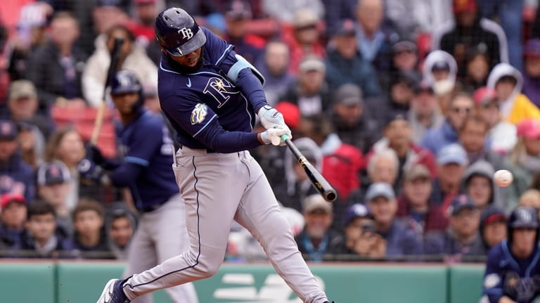 Tampa Bay Rays' Manuel Margot singles to left field allowing...