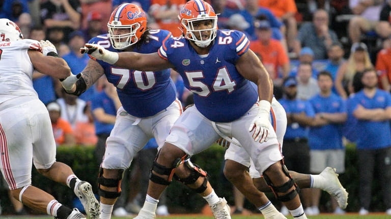 FILE -Florida offensive lineman O'Cyrus Torrence (54) blocks during the...