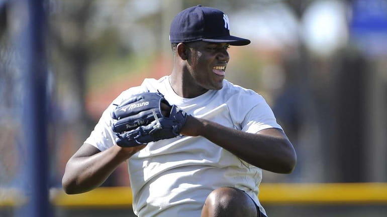 New York Yankees pitcher Michael Pineda works out during a...