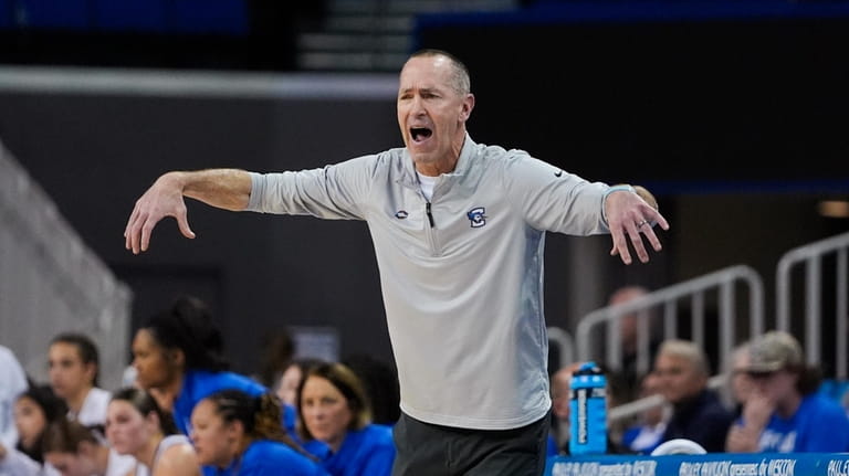 Creighton coach Jim Flanery gestures during the second half of...