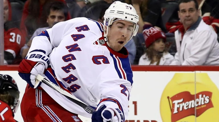 Ryan McDonagh #27 of the New York Rangers takes a...