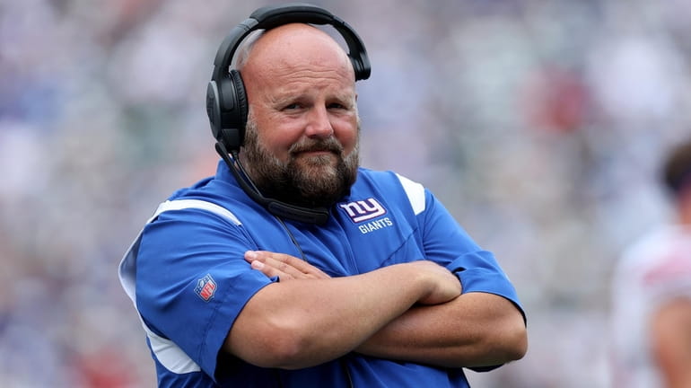 Giants head coach Brian Daboll coaches against the Jets during...