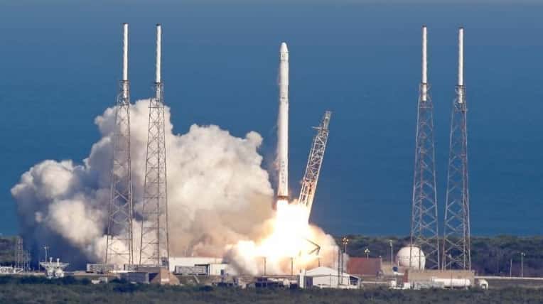 The SpaceX Falcon 9 rocket lifts off from launch complex...