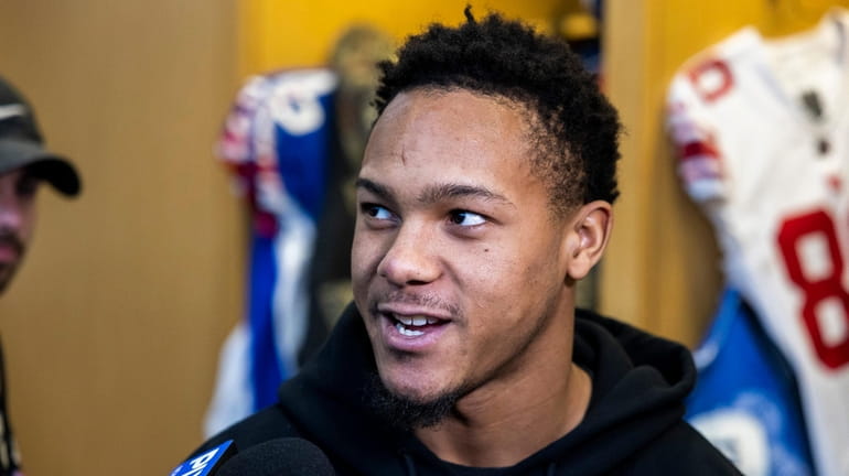Giants wide receiver Wan'Dale Robinson speaks to the media at...