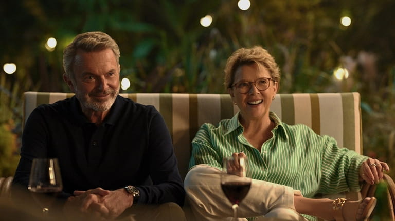 This image released by Peacock shows Sam Neill, left, and...