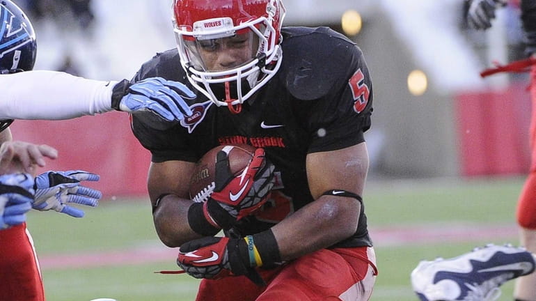 Stony Brook's Miguel Maysonet rushes to the one-yard line in...