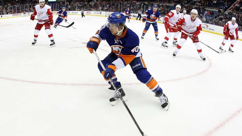 Michael Grabner #40 of the New York Islanders skates against...
