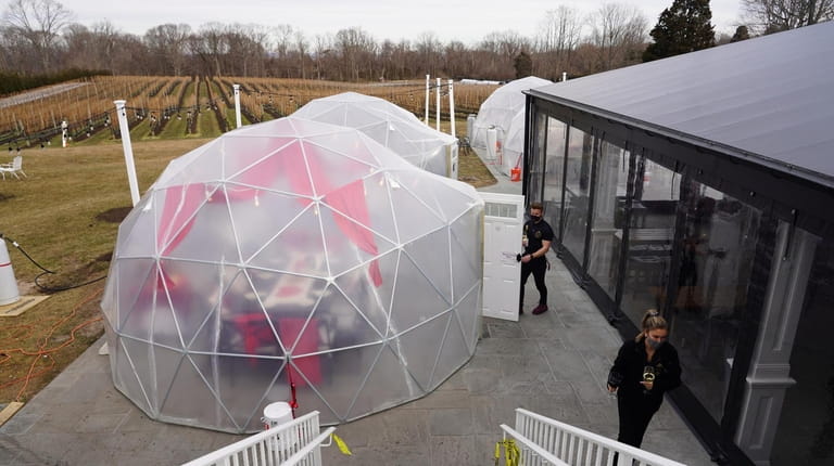 Del Vino Vineyards in Northport, which has erected heated "igloos" for...
