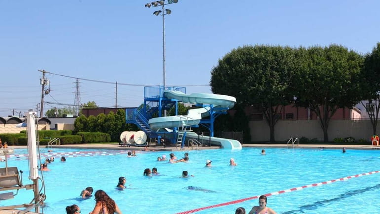 A community pool is one of the attractions of Mineola,...