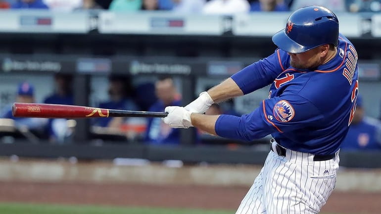 New York Mets first baseman Lucas Duda (21) doubles to...