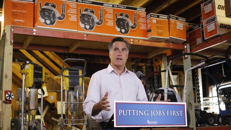 Republican presidential candidate Mitt Romney speaks about job numbers at...