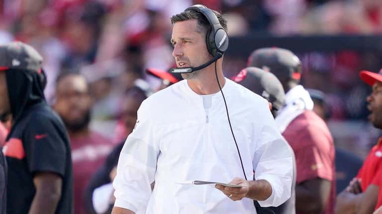 49ers head coach Kyle Shanahan watches during the second half...