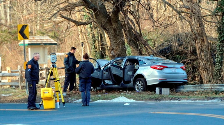 Suffolk County police investigate a fatal accident on Fort Salonga...