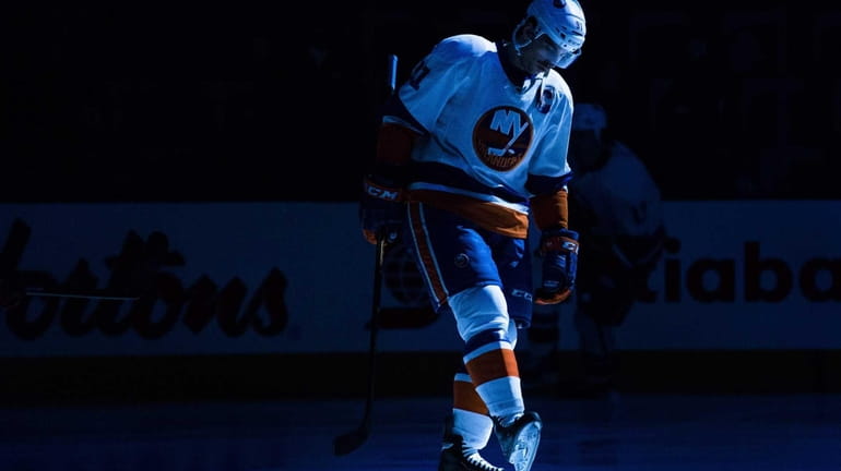 New York Islanders John Tavares skates in the pre-game spotlight...