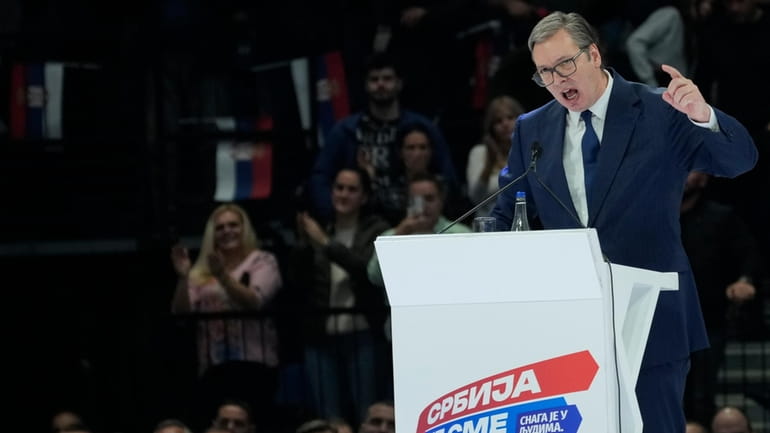 Serbian President Aleksandar Vucic speaks during a pre-election rally of...