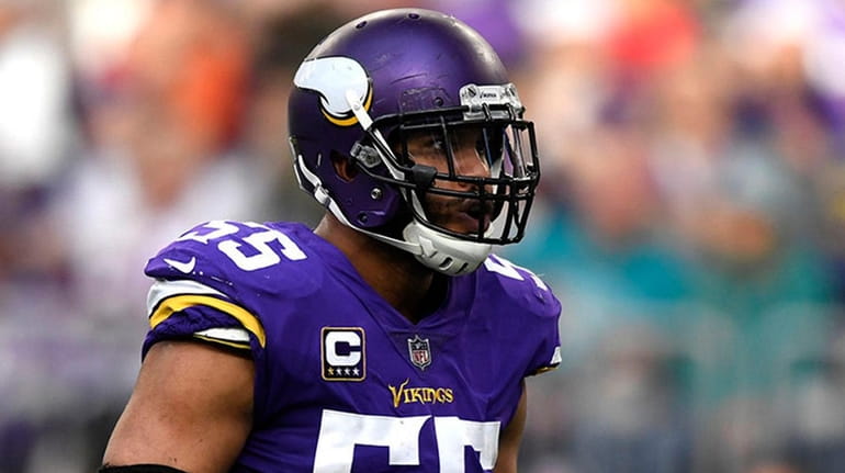 Vikings linebacker Anthony Barr reacts after sacking Dolphins quarterback Ryan...
