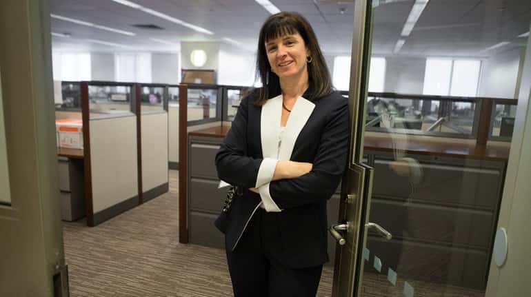 Theresa Mulder, seen here at her office at JPMorgan Chase...