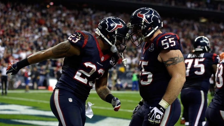 From left, Houston Texans running back Arian Foster #23 and...