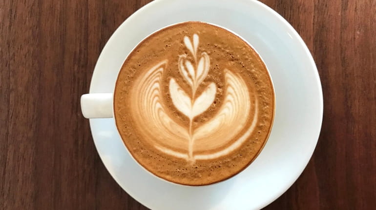 A latte at Pipeline Coffee Co., which has opened a...