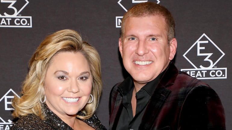 Julie and Todd Chrisley have been sentenced to serve a...