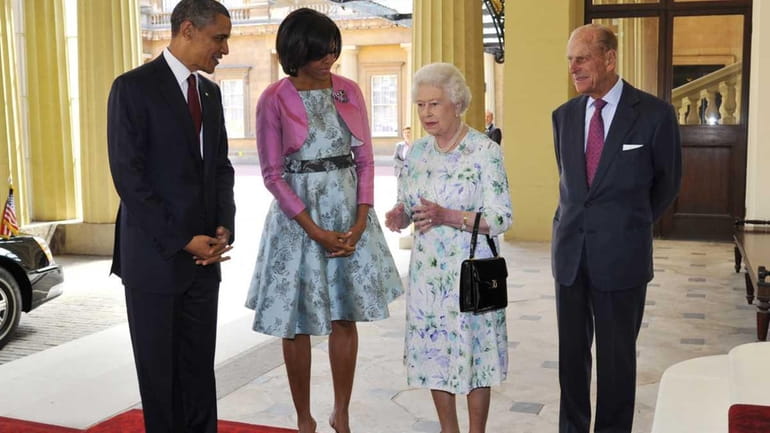 President Barack Obama and first lady Michelle Obama with Britain's...