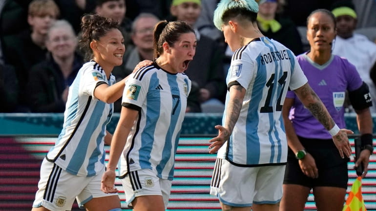 Argentina's Romina Nunez, center, celebrates scoring their second goal of...