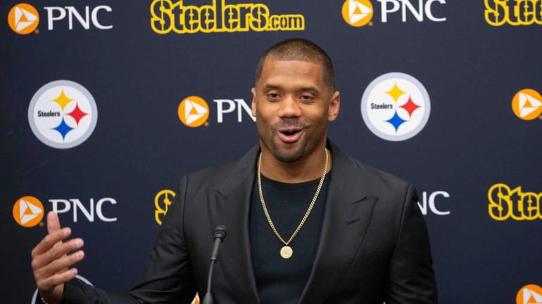 Pittsburgh Steelers newly-signed quarterback Russell Wilson speaks with reporters during...