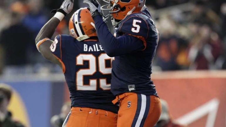 Syracuse wide receiver Marcus Sales celebrates with running back Antwon...