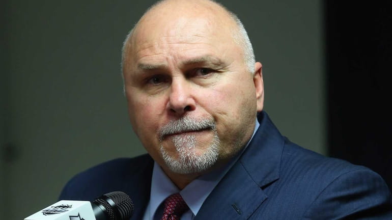 Barry Trotz of the Washington Capitals speaks with the media...