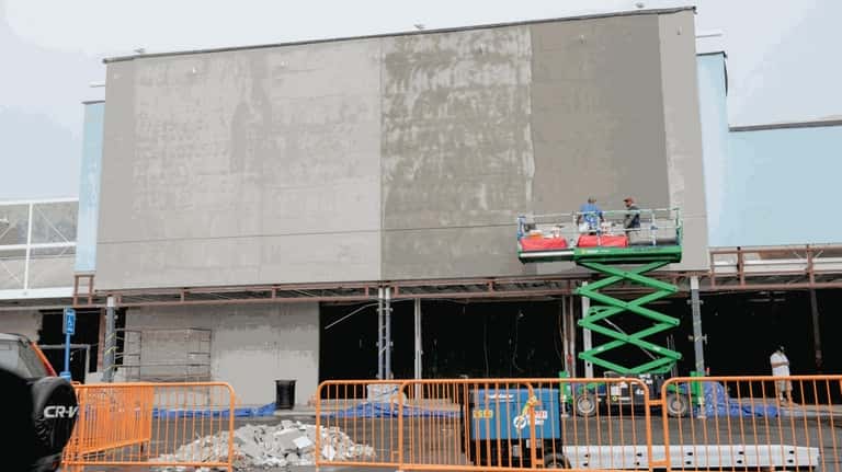 Construction continues on a planned Whole Foods, slated to open in...