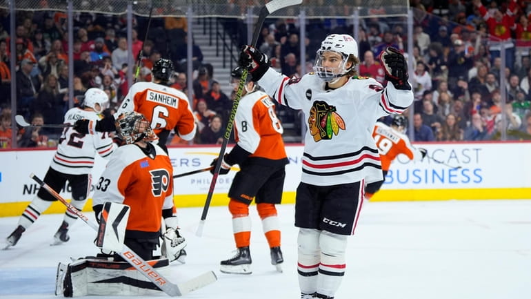 Chicago Blackhawks' Connor Bedard (98) reacts after a goal by...