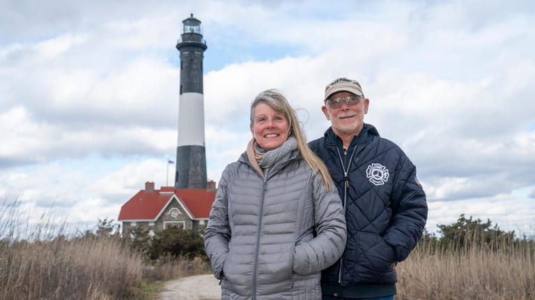 Year-round Fire Island residents Judi and Rusty Phelan in front of the...