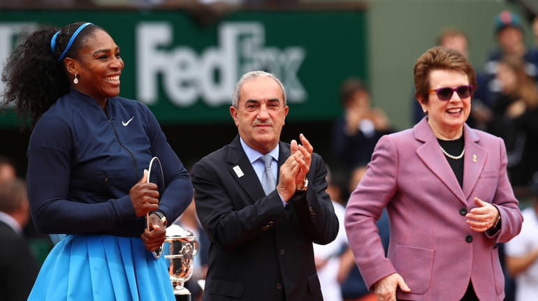 Serena Williams of the United States receives the runners up...