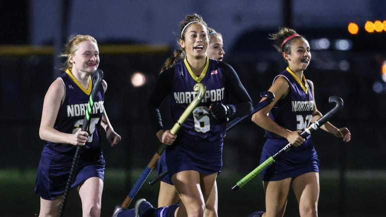 Olivia McKenna (6) of Northport scores the first goal of...