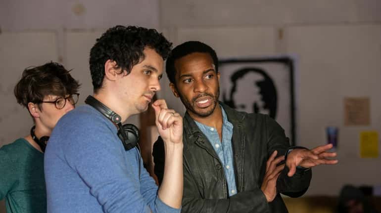This image released by Netflix shows director Damien Chazelle, left,...