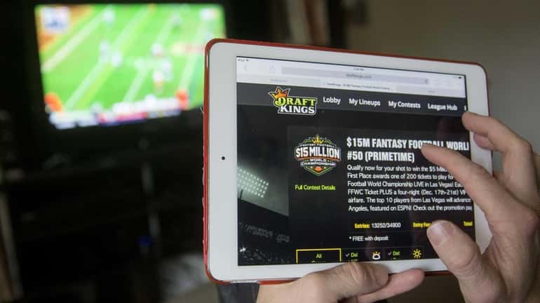 The DraftKings Inc. website is arranged for a photograph on...