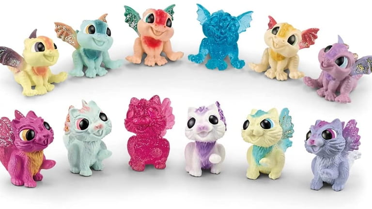 Three winged kittens and three baby dragons from Schleich are...