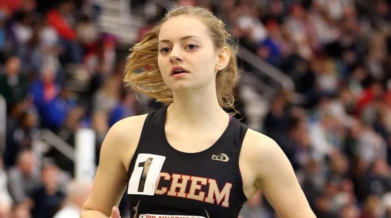Margaret Atwood of Sachem East wins the girl's 1500 meter...