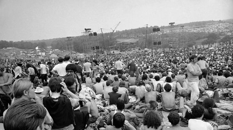 A portion of the 400,000 concert goers who attended the...