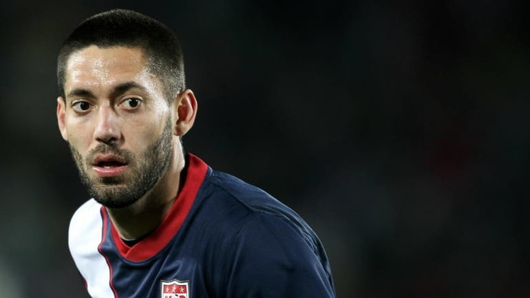 Clint Dempsey of the United States looks on during a...