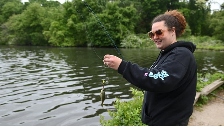 Steffanie Wachter, of Wading River, is "catch-and-release" fishing on Kahlers Pond in...
