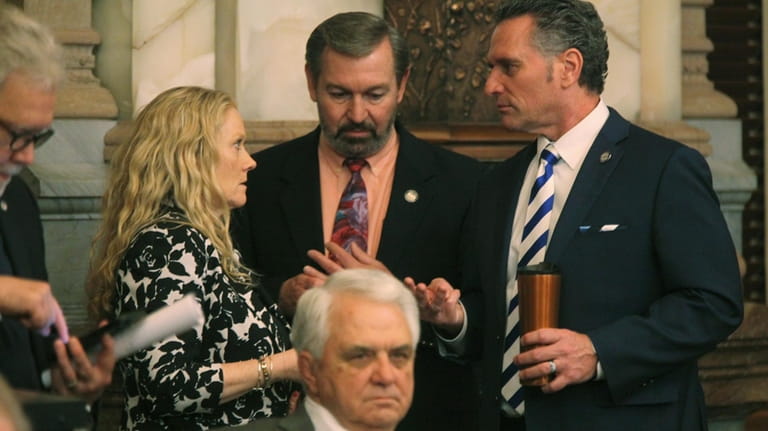 Kansas Senate President Ty Masterson, right, R-Andover, confers with Sen....