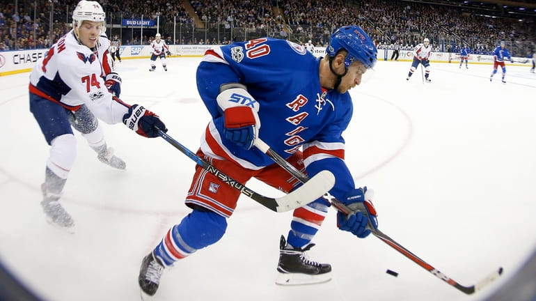 Michael Grabner #40 of the New York Rangers plays the...