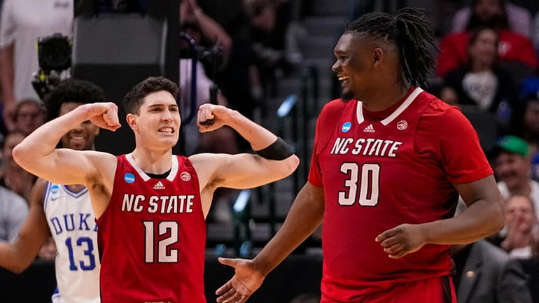 North Carolina State's Michael O'Connell (12) reacts after a basket...