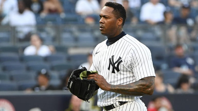Yankees relief pitcher Aroldis Chapman is booed by fans as...