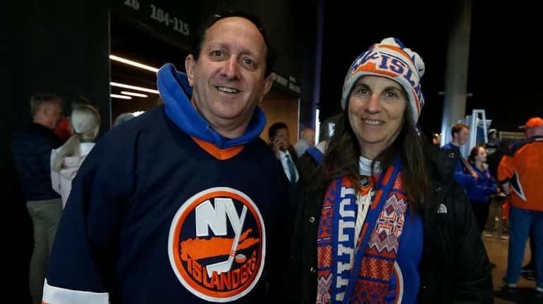 Islanders fans Marc and Loree Tand from Merrick attend Game...