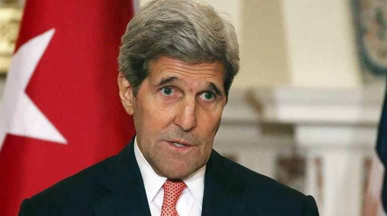 U.S. Secretary of State John Kerry speaks during a news...