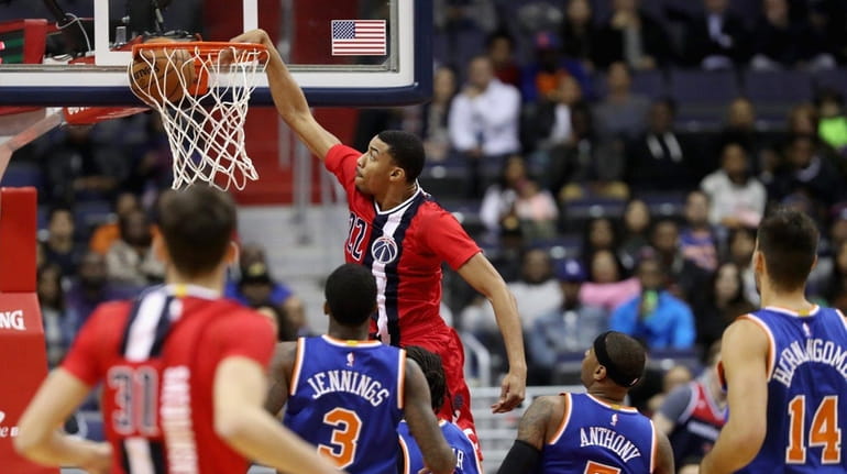 Otto Porter Jr. of the Washington Wizards dunks against the...