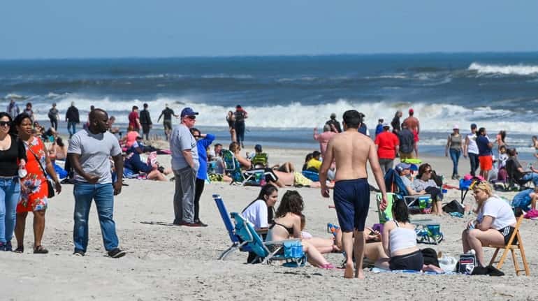 Beachgoers on Field 4 at Robert Moses State Park on...