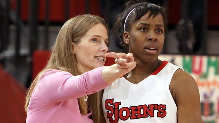 St. John's women's basketball coach Kim Barnes Arico and Eugeneia...